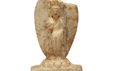 A Chinese marble Buddhist votive stele Sui dynasty Carved as a bodhisattva...