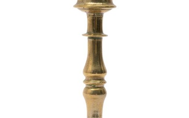 A Flemish brass candlestick