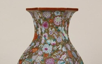 A GILTED GROUND FAMILLE- ROSE VASE.MARK OF QIANLONG