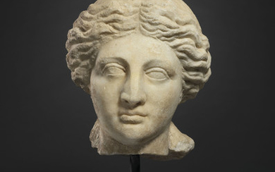 A GREEK MARBLE PORTRAIT HEAD OF A WOMAN, HELLENISTIC PERIOD, CIRCA MID-3RD CENTURY B.C.