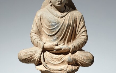 A Gandhara grey schist figure of Buddha Shakyamuni. Pakistan. 2nd/3rd century
