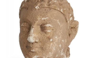 A Gandhara stucco head of a Buddha,...