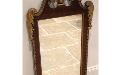 A George II walnut, giltwood and gesso pier mirror, the acan...