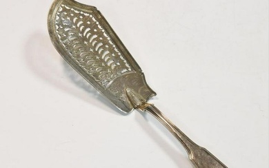 A George III silver fish slice, mark of Paul Storr, London 1818, 'Fiddle, Thread & Shell' pattern