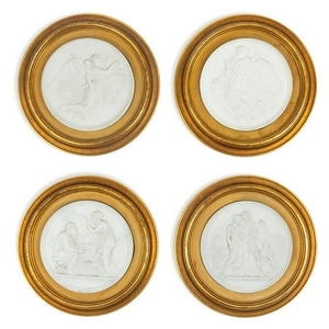 A Group of Four Bisque Plaques