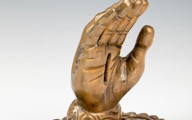 A LARGE BRASS CHARITY RECEPTION HAND. In the style...