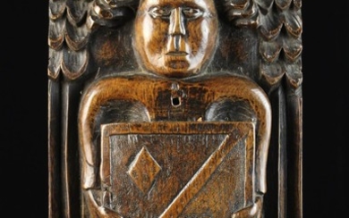 A Late 16th/Early 17th Century Relief Carved Oak Boss/Panel emblazoned with a angel with outswept ha