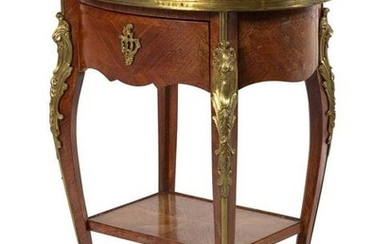 A Louis XV Style Gilt Bronze Mounted Kingwood Table