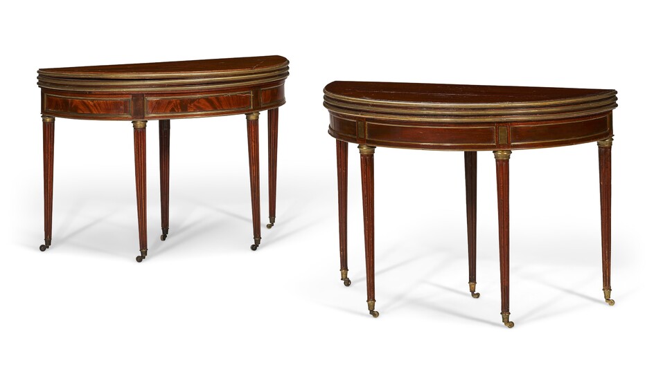 A MATCHED PAIR OF LATE LOUIS XVI ORMOLU-MOUNTED MAHOGANY GAMES TABLES