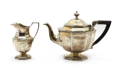A Mappin and Webb silver teapot and cream jug