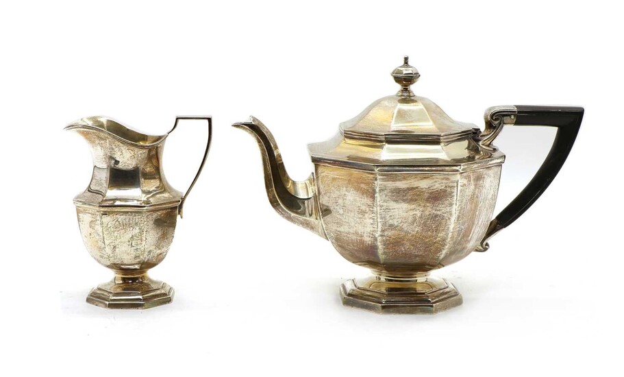 A Mappin and Webb silver teapot and cream jug