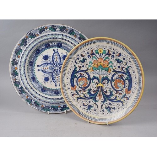 A Mariucci Deruta polychrome enamel charger with traditional...