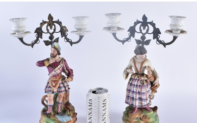 A PAIR OF 19TH CENTURY FRENCH PARIS BISQUE PORCELAIN CANDLES...