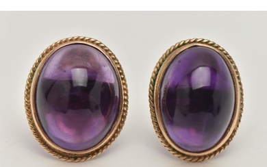 A PAIR OF AMETHYST CABOCHON STUD EARRINGS, the oval cabochon...