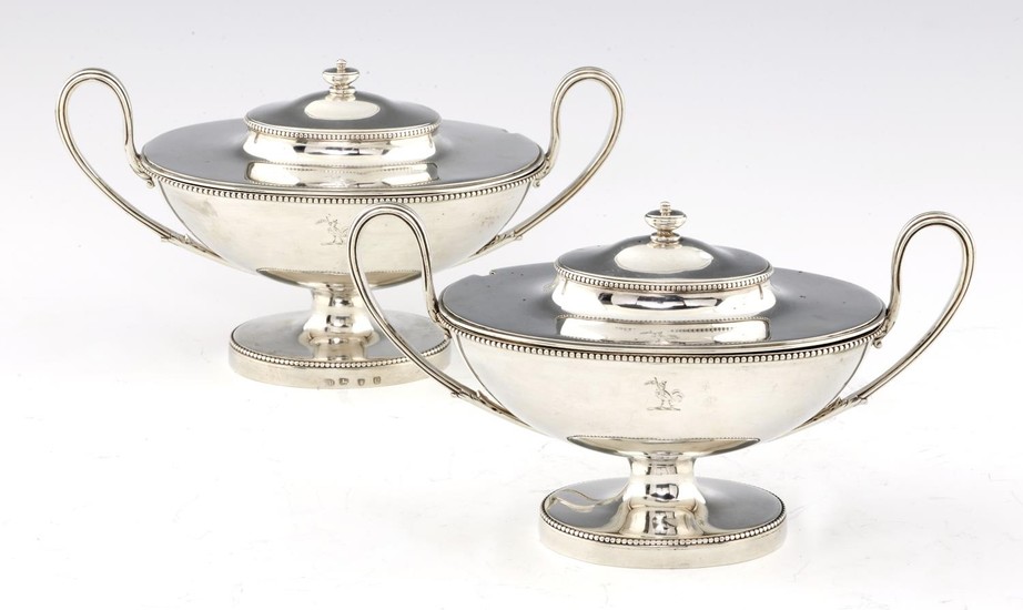 A PAIR OF GEORGE III OVAL SILVER SAUCE TUREENS AND COVERS wi...