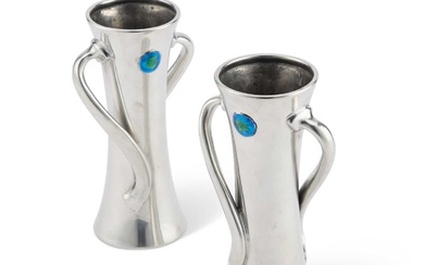 A PAIR OF LIBERTY & CO TUDRIC PEWTER AND ENAMEL VASES