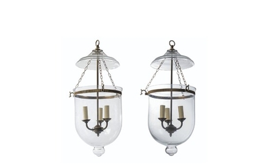 A PAIR OF PATINATED-BRASS AND GLASS HANGING LIGHTS