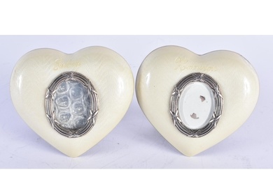 A PAIR OF VINTAGE SILVER AND ENAMEL HEART SHAPED PHOTOGRAPH ...
