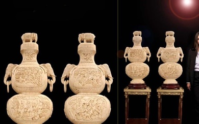 A Pair of Monumental Chinese Bone Vases/Urns