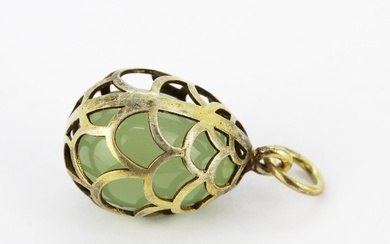 A Russian pierced silver gilt jade egg pendant, L. 2.8cm.