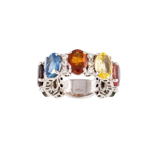 A SAPPHIRE AND DIAMOND DRESS RING, set with multi coloured o...