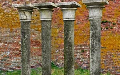 A SET OF FOUR CARVED LIMESTONE COLUMNS, 20TH CENTURY