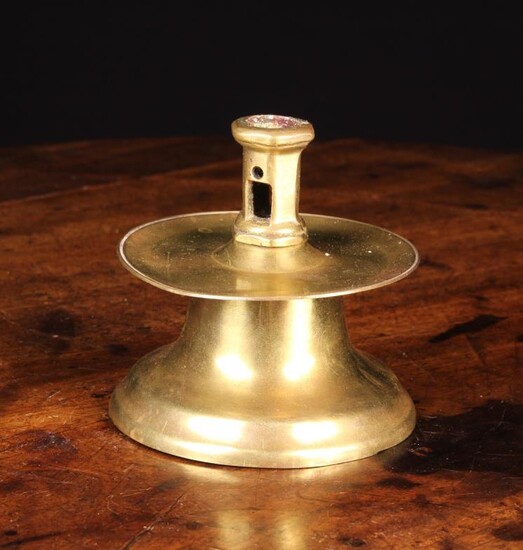 A Small 16th Century Brass Capstan Candlestick, the nozzle...