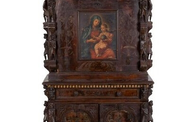 A Spanish Colonial Style Carved Oak and Painted