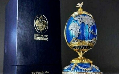 A VERY RARE JEWELED STERLING SILVER FABERGE EGG