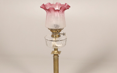 A VICTORIAN BRASS COLUMN OIL LAMP.