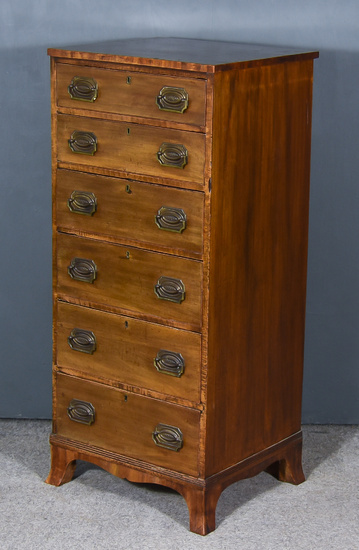 A Victorian Mahogany Chest, with square edge to top, fitted...