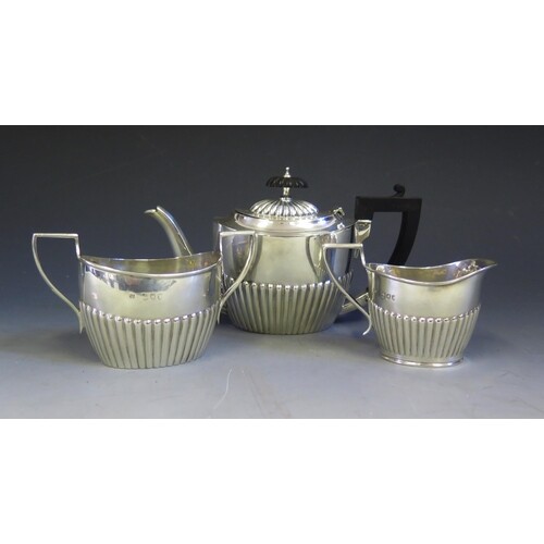 A Victorian Silver Bachelor's Three Part Tea Set with gadroo...