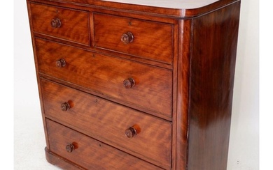 A Victorian mahogany chest of two short and three long drawe...