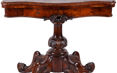 A Victorian walnut and burr-walnut games table, 19th Century...