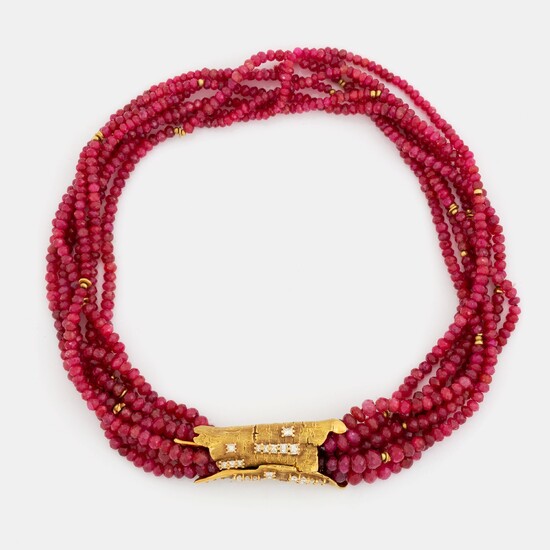 A W Nussberger ruby necklace with an 18K gold clasp set with princess-cut diamonds