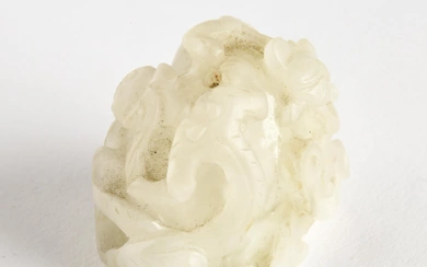 A White Jade 'Dragon' Finial, Yuan Dynasty (1279-1368)
