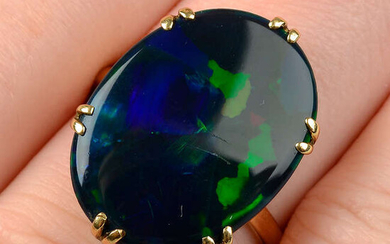 A black opal single-stone ring.