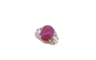 A cabochon ruby and diamond dress ring
