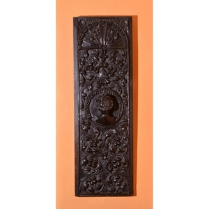 A carved oak panel, late 16th/early 17th century