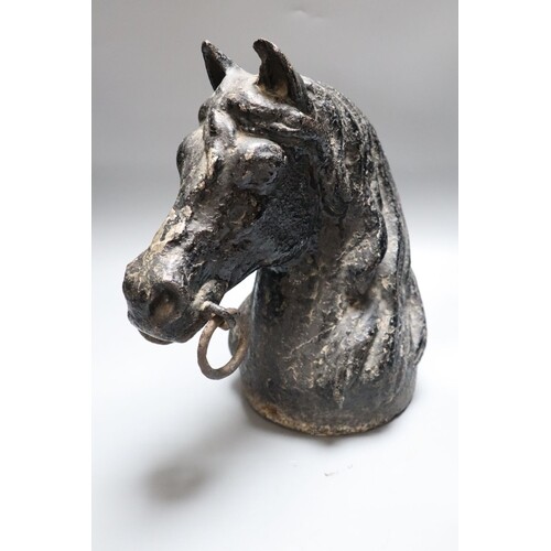 A cast iron horse tethering post, c.1900, height 28cm, of ho...