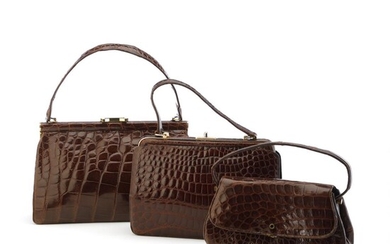 SOLD. A collection comprising of three bags of brown crocodile skin with gold tone hardware. (3) – Bruun Rasmussen Auctioneers of Fine Art