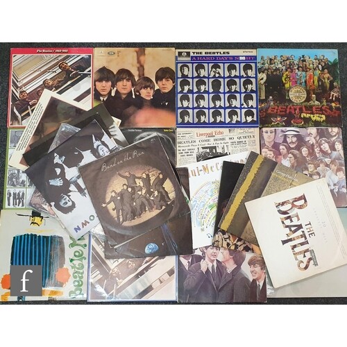 A collection of Beatles LPs to include Hard Day's Night, PCS...