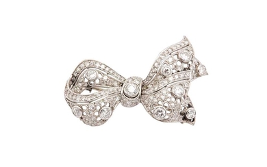 A diamond bow brooch