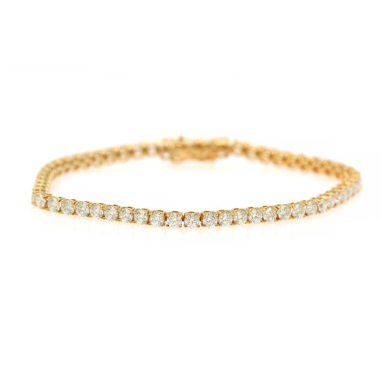 A diamond bracelet set with numerous brilliant-cut diamonds totalling app. 6.50 ct., mounted in 14k gold. L. 19 cm.