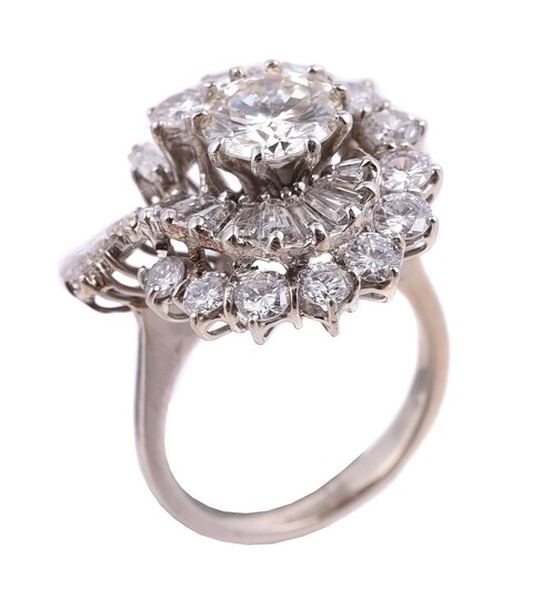 A diamond cluster dress ring