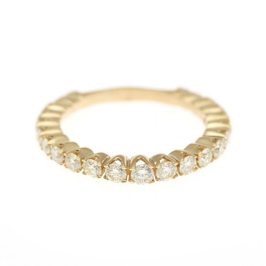A diamond eternity ring set with numerous brilliant-cut diamonds totalling app. 1.25 ct., mounte in 14k gold. Size 58.