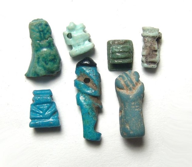 A group of 7 Egyptian faience amulets