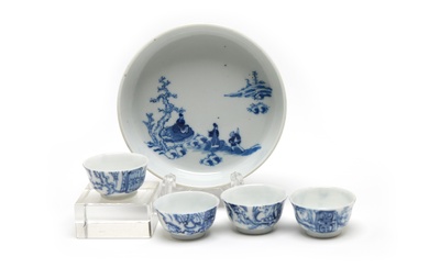 A group of blue and white porcelain tea set comprising teacups and a round tray each painted with plum branches, Chinese characters and figurine under the pine tree