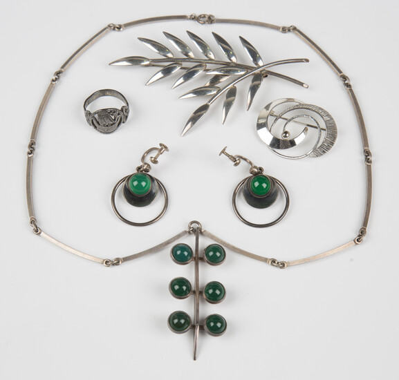 A group of mostly Scandinavian silver jewellery, comprising a cabochon green stained agate pendant n