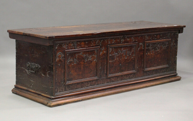 A large 17th century Italian cedar and walnut Adige chest, the lid hinged to reveal poker and pen wo